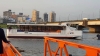 Un bateau de l'entreprise STL sur la lagune Ebri&eacute; &agrave; Abidjan